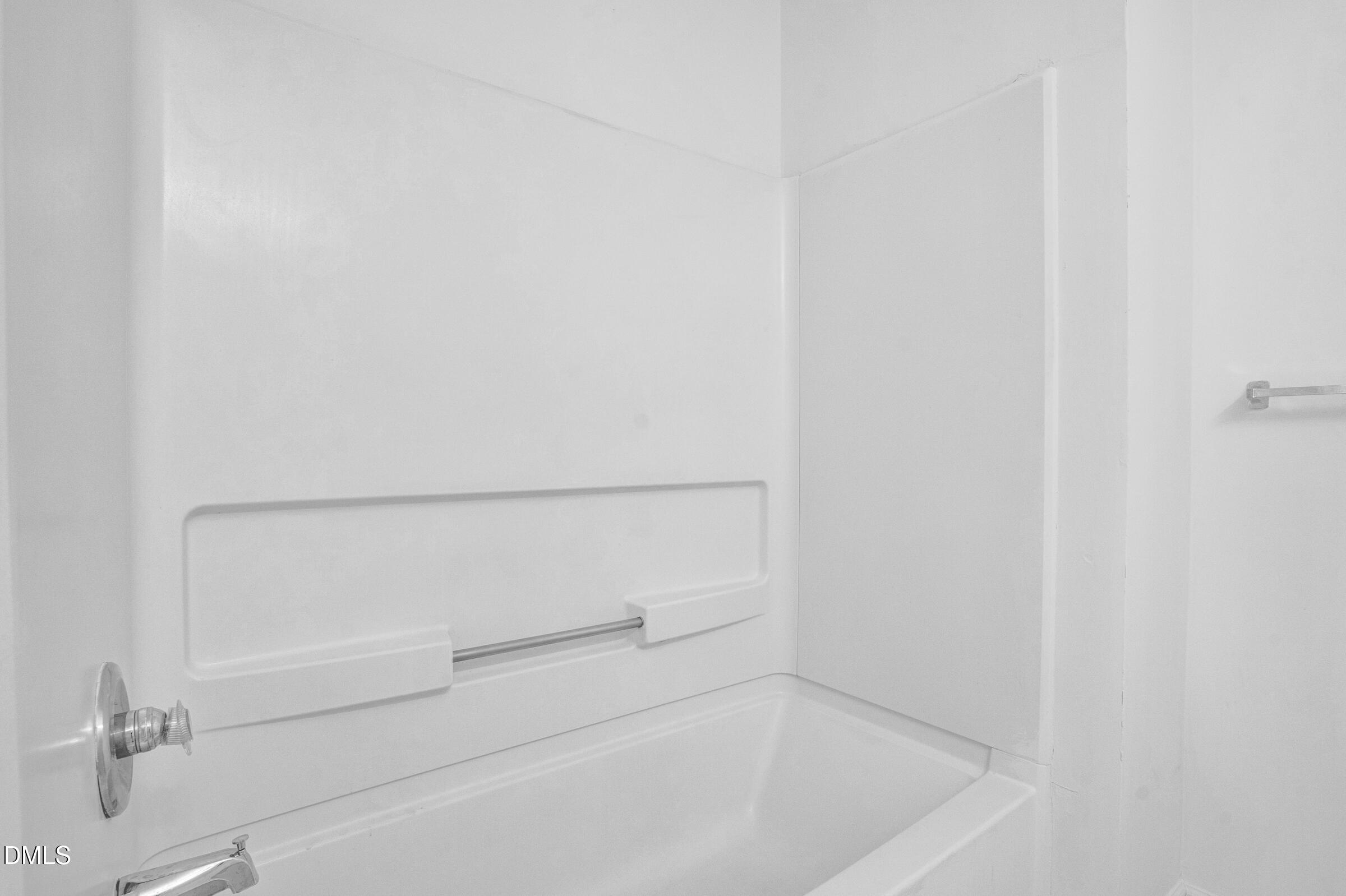 1911 Wolf Tech Lane, Unit 302 Raleigh, NC 27603 - Photo 17 of 20 a close up of a bathtub
