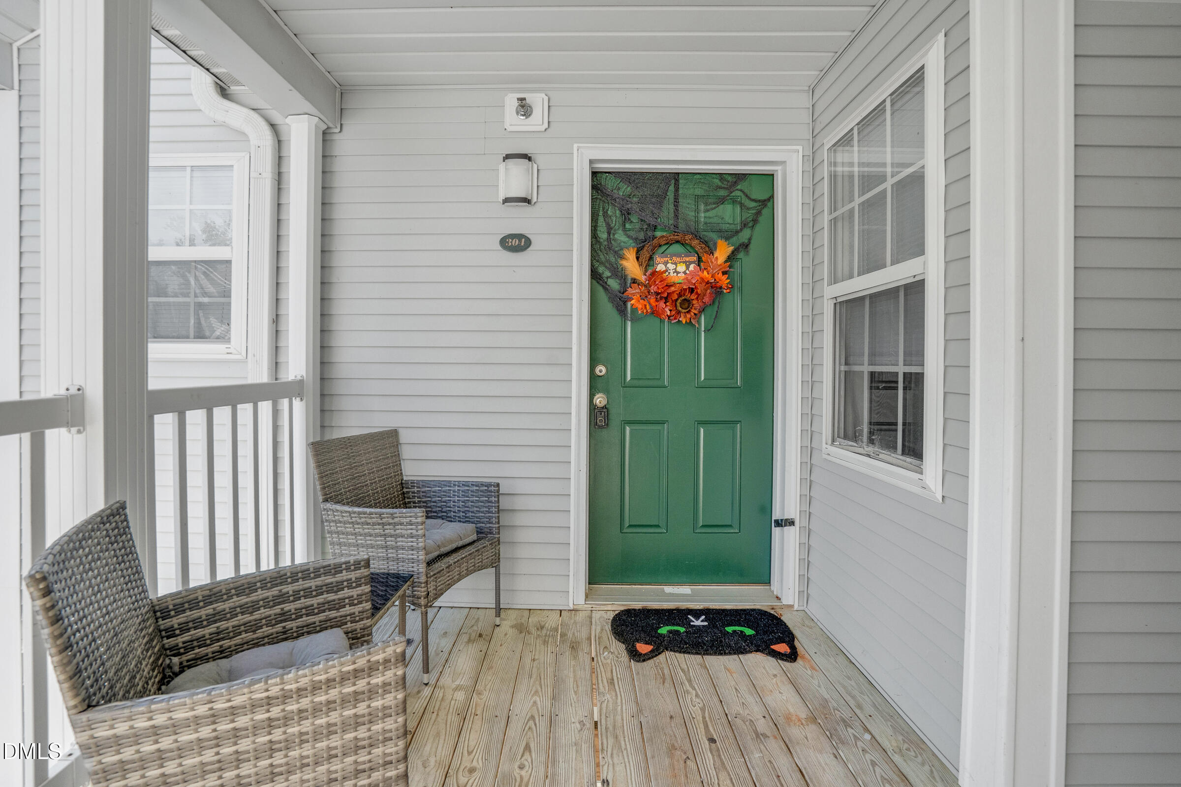 1911 Wolf Tech Lane, Unit 302 Raleigh, NC 27603 - Photo 3 of 20 a view of a balcony and a wooden floor