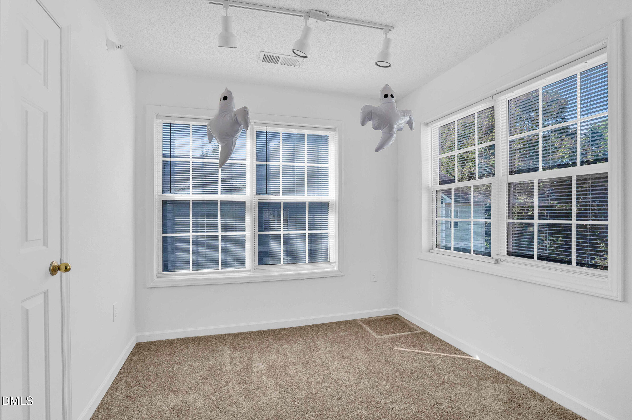 1911 Wolf Tech Lane, Unit 302 Raleigh, NC 27603 - Photo 9 of 20 a view of an empty room with a window