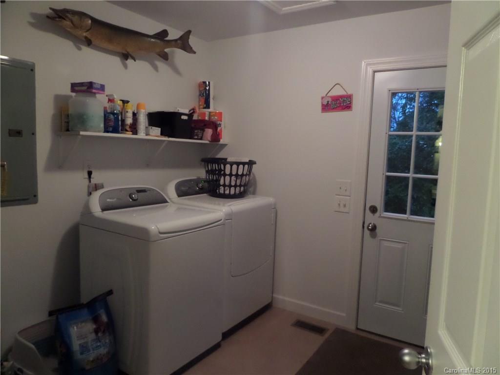 161 Quail Ridge Lane Fort Mill, SC 29708 - Photo 14 of 24 a utility room with dryer and washer