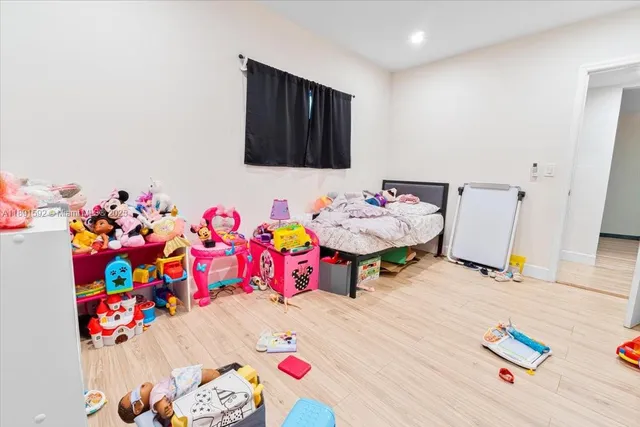 a view of play room with toys and toys