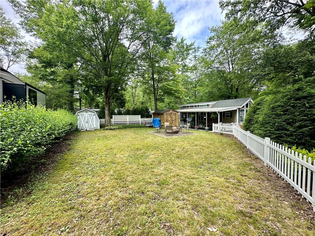 1150 West Park Road Slippery Rock, PA 16057 - Photo 2 of 22 a house with swimming pool in the back