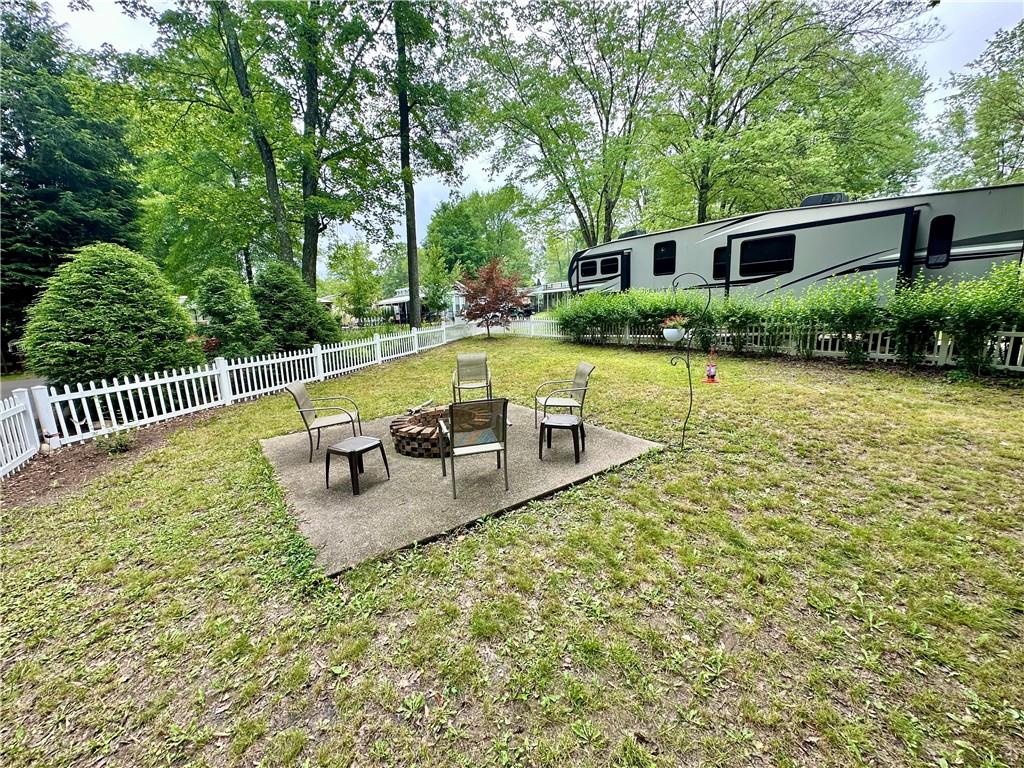 1150 West Park Road Slippery Rock, PA 16057 - Photo 3 of 22 a view of a house with swimming pool and sitting area