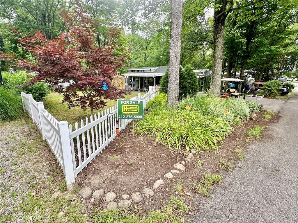 1150 West Park Road Slippery Rock, PA 16057 - Photo 6 of 22 a view of house with backyard and tree