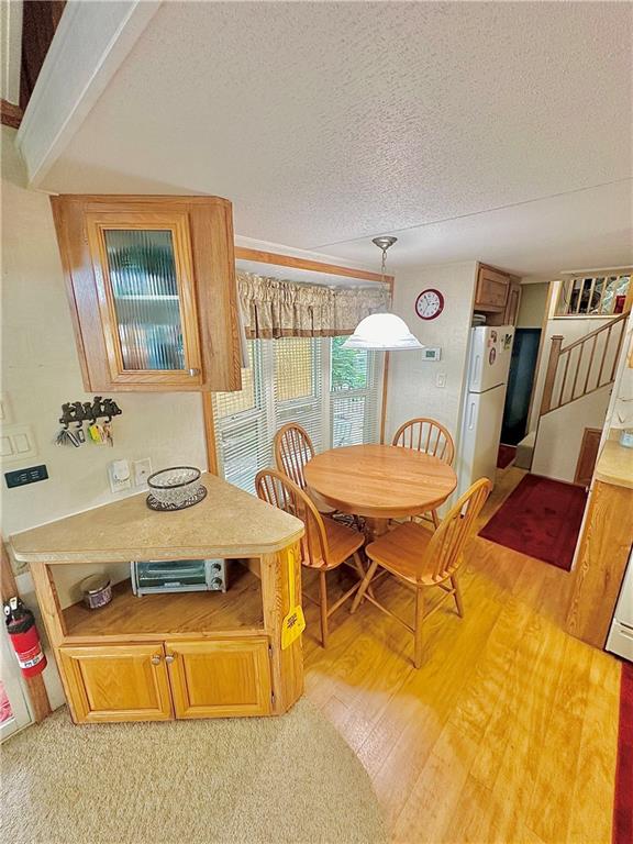1150 West Park Road Slippery Rock, PA 16057 - Photo 9 of 22 a dining room with furniture and wooden floor