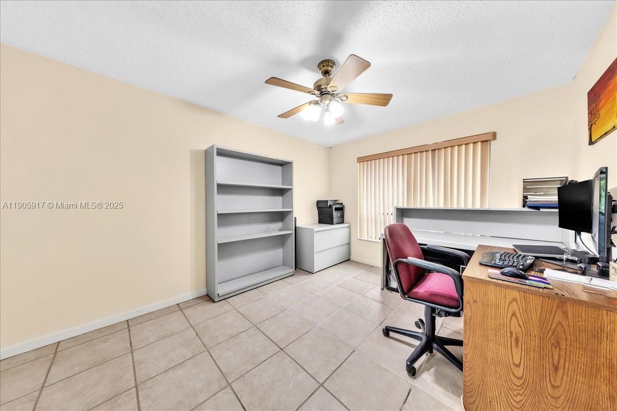 3930 Northwest 79th Way Davie, FL 33024 - Photo 13 of 33 a room with furniture and a window