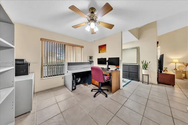 a livingroom with furniture and a fireplace