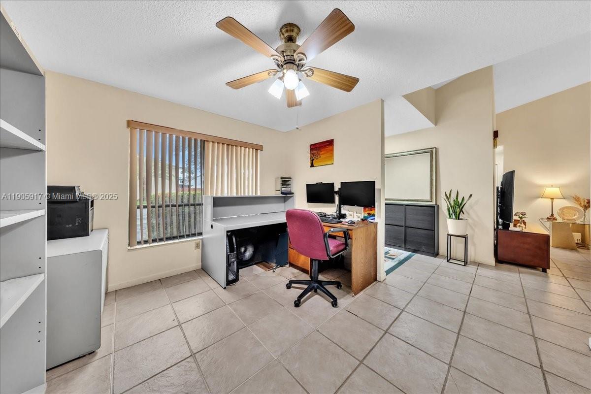 3930 Northwest 79th Way Davie, FL 33024 - Photo 14 of 33 a livingroom with furniture and a fireplace