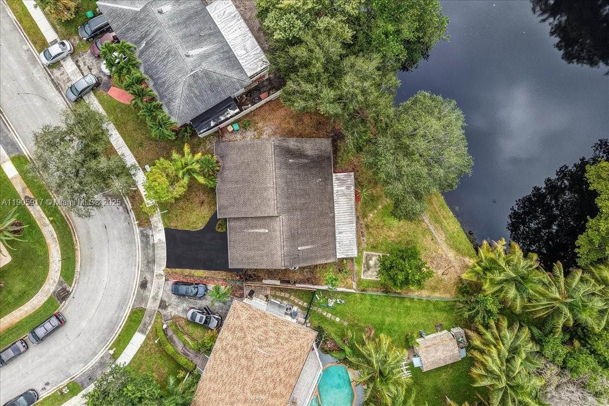 3930 Northwest 79th Way Davie, FL 33024 - Photo 2 of 33 an aerial view of a house with a garden