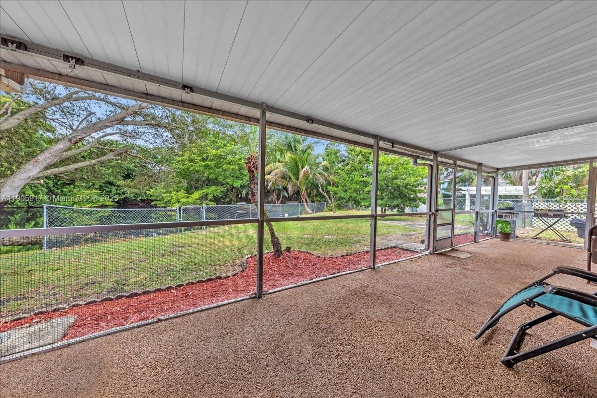 3930 Northwest 79th Way Davie, FL 33024 - Photo 25 of 33 a view of a garden with an outdoor seating