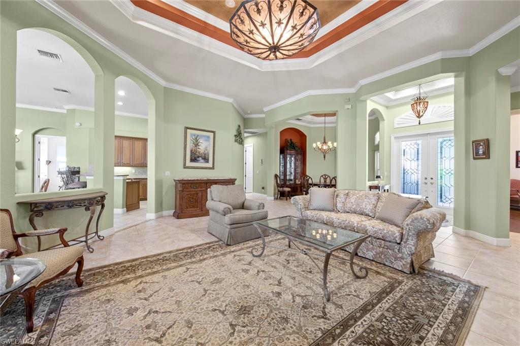 8478 Sedonia Circle Estero, FL 33967 - Photo 12 of 50 Living room, dining to middle right, kitchen to left