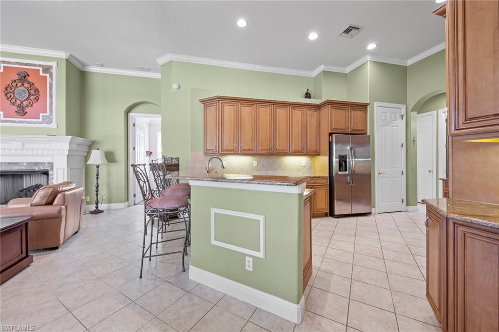 8478 Sedonia Circle Estero, FL 33967 - Photo 18 of 50 Pantry to right of refrigerator