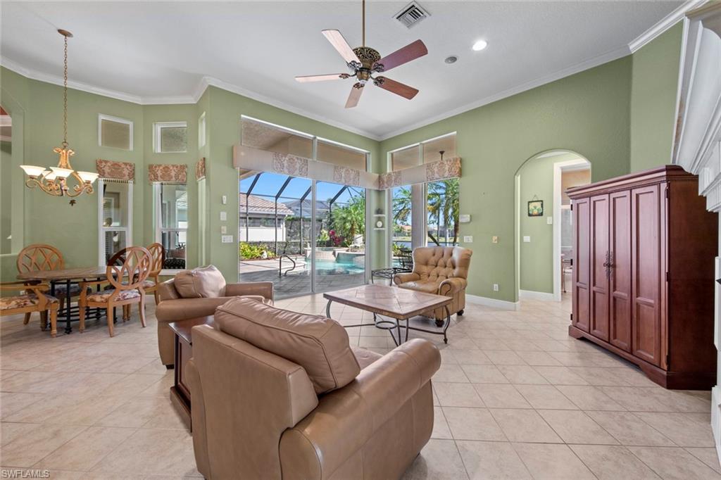 8478 Sedonia Circle Estero, FL 33967 - Photo 22 of 50 Family room w/double slider access to lanai