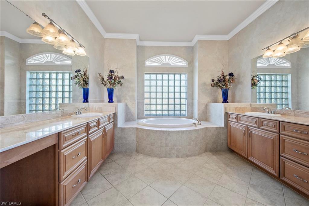 8478 Sedonia Circle Estero, FL 33967 - Photo 26 of 50 Master bath has dual vanities, large soaking tub