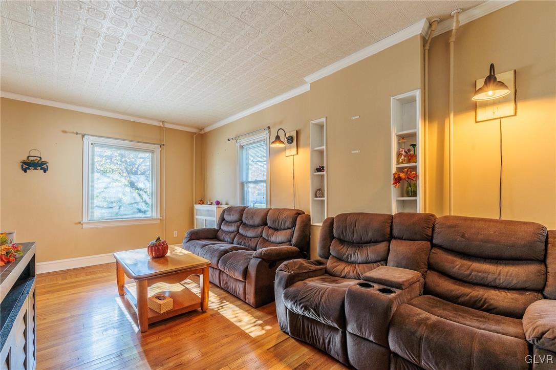 615 Alpha Road Wind Gap, PA 18091 - Photo 20 of 38 a living room with furniture and a window