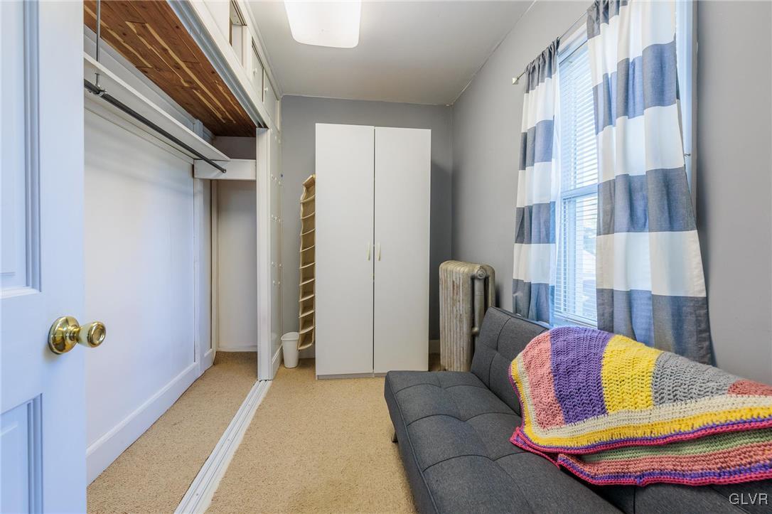 615 Alpha Road Wind Gap, PA 18091 - Photo 22 of 38 a bedroom with furniture and a book shelf