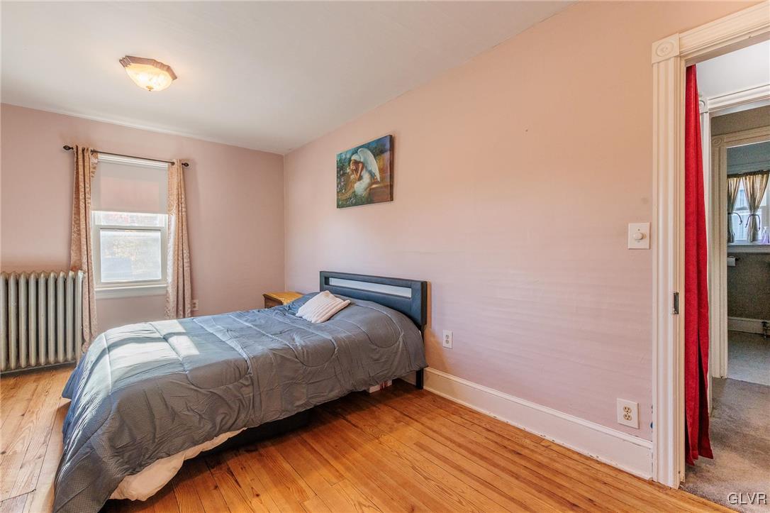 615 Alpha Road Wind Gap, PA 18091 - Photo 31 of 38 a bedroom with a bed and a window