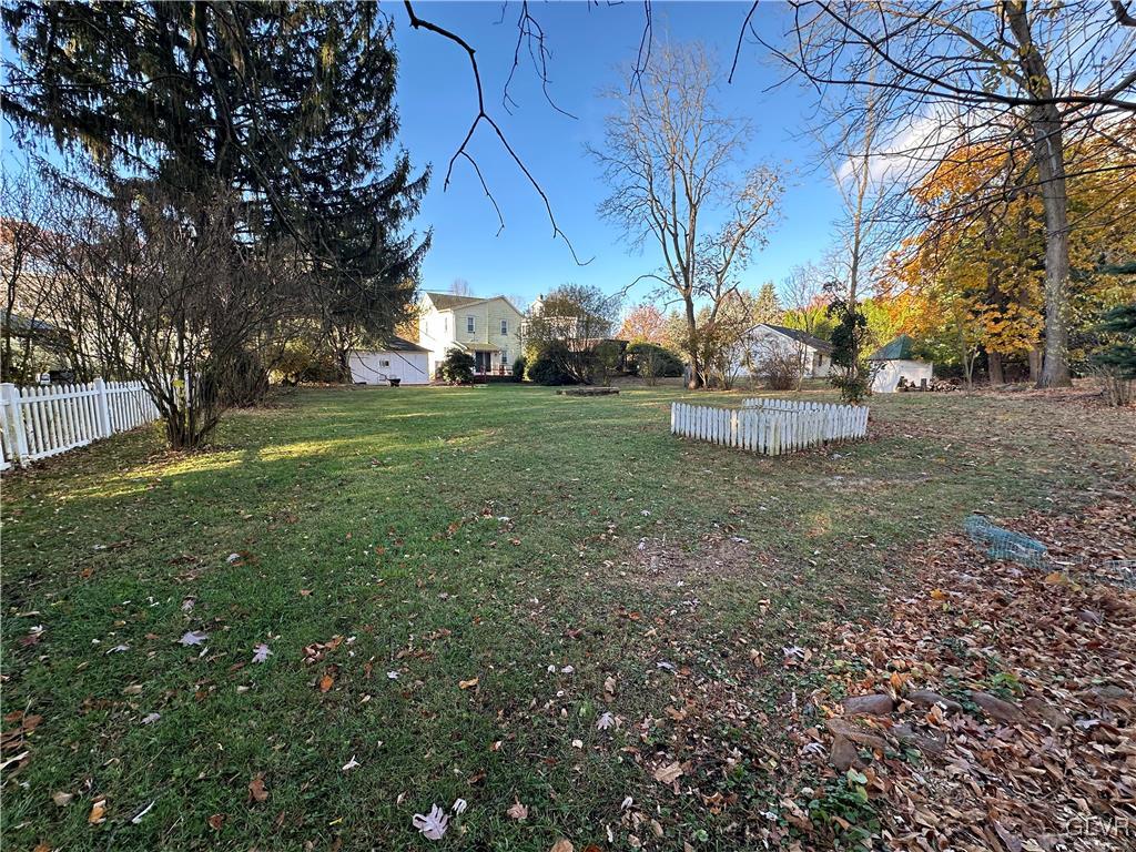 615 Alpha Road Wind Gap, PA 18091 - Photo 34 of 38 a view of a garden with large tree