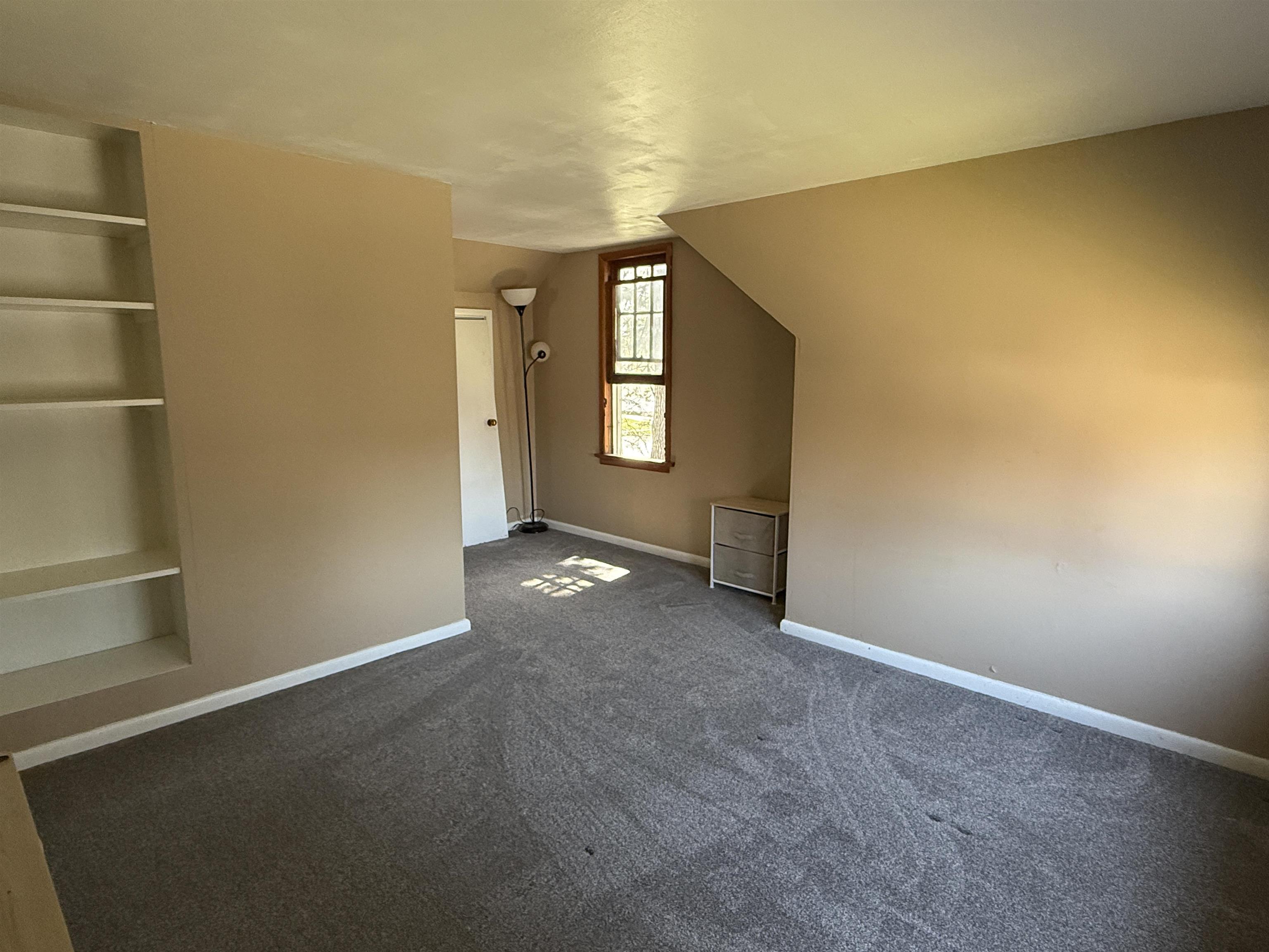 1038 North 8th Street Rochelle, IL 61068 - Photo 15 of 24 an empty room with windows