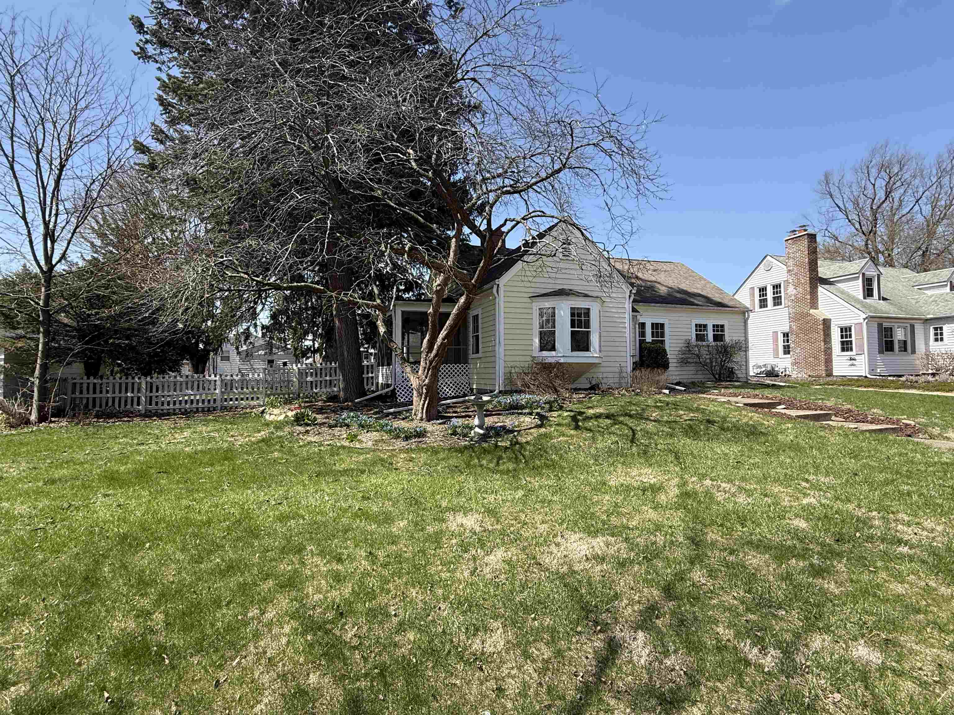 1038 North 8th Street Rochelle, IL 61068 - Photo 23 of 24 a front view of a house with a yard