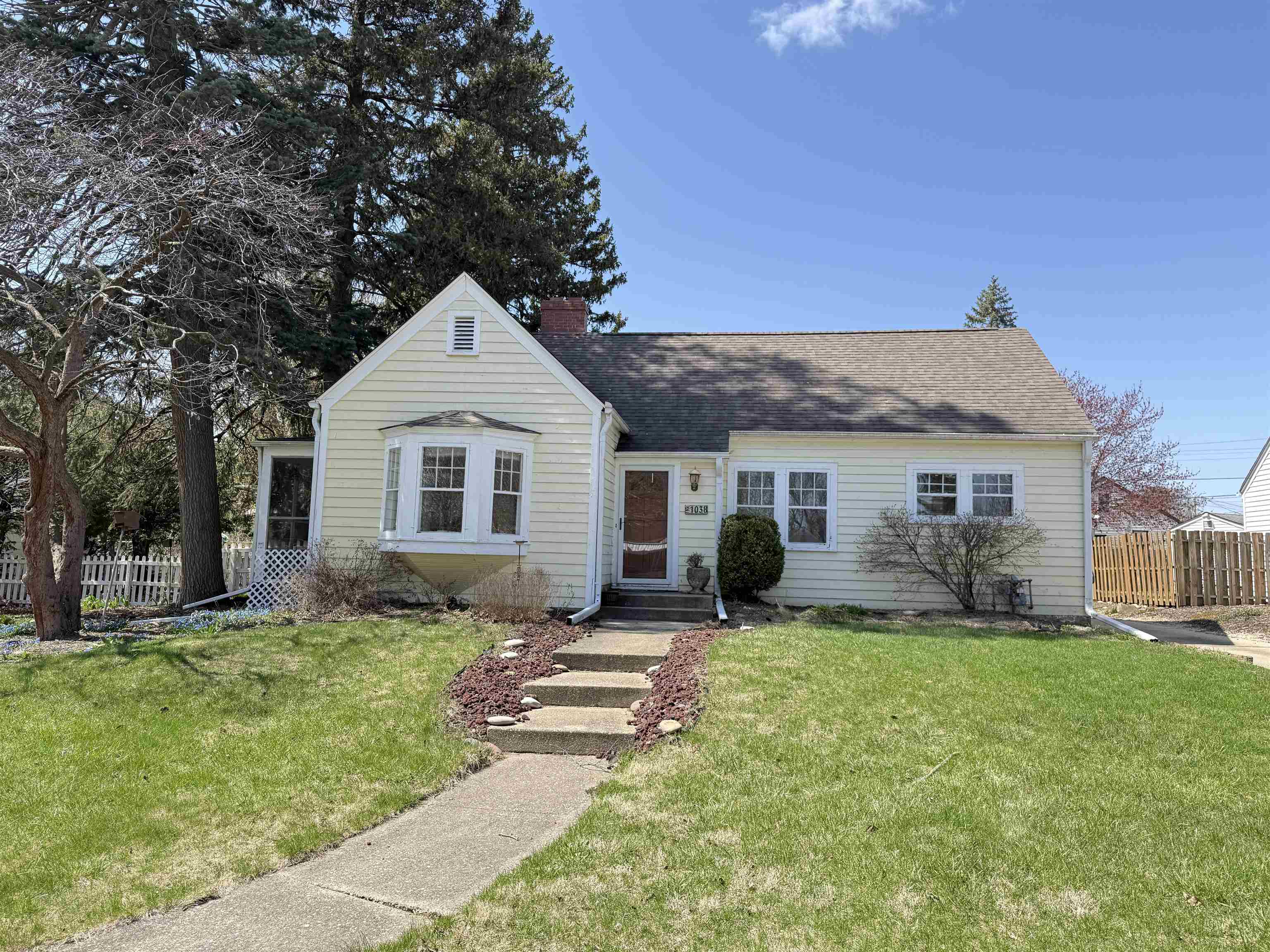 1038 North 8th Street Rochelle, IL 61068 - Photo 24 of 24 a front view of house with yard outdoor seating and green space