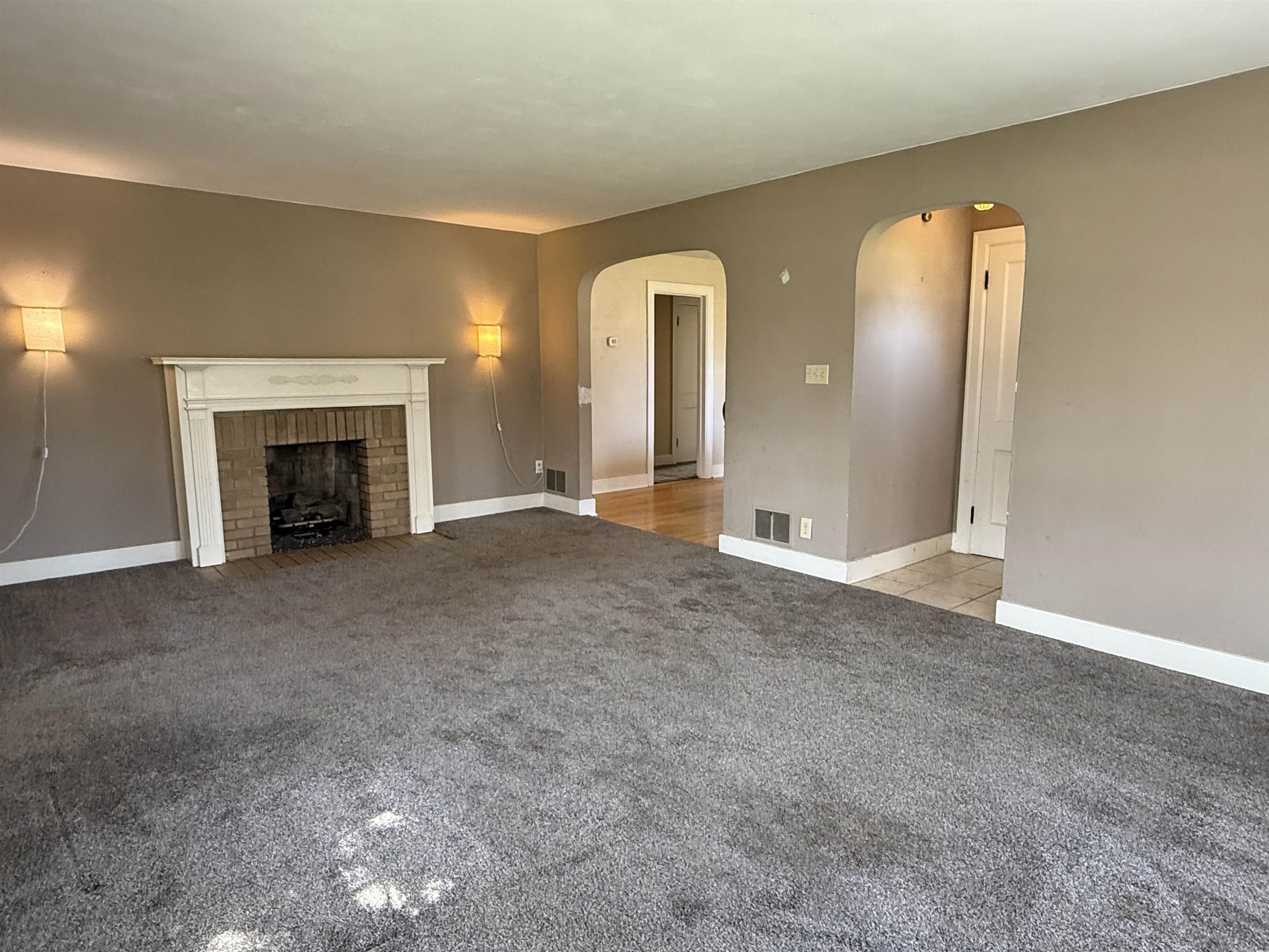 1038 North 8th Street Rochelle, IL 61068 - Photo 3 of 24 a view of a livingroom with a fireplace