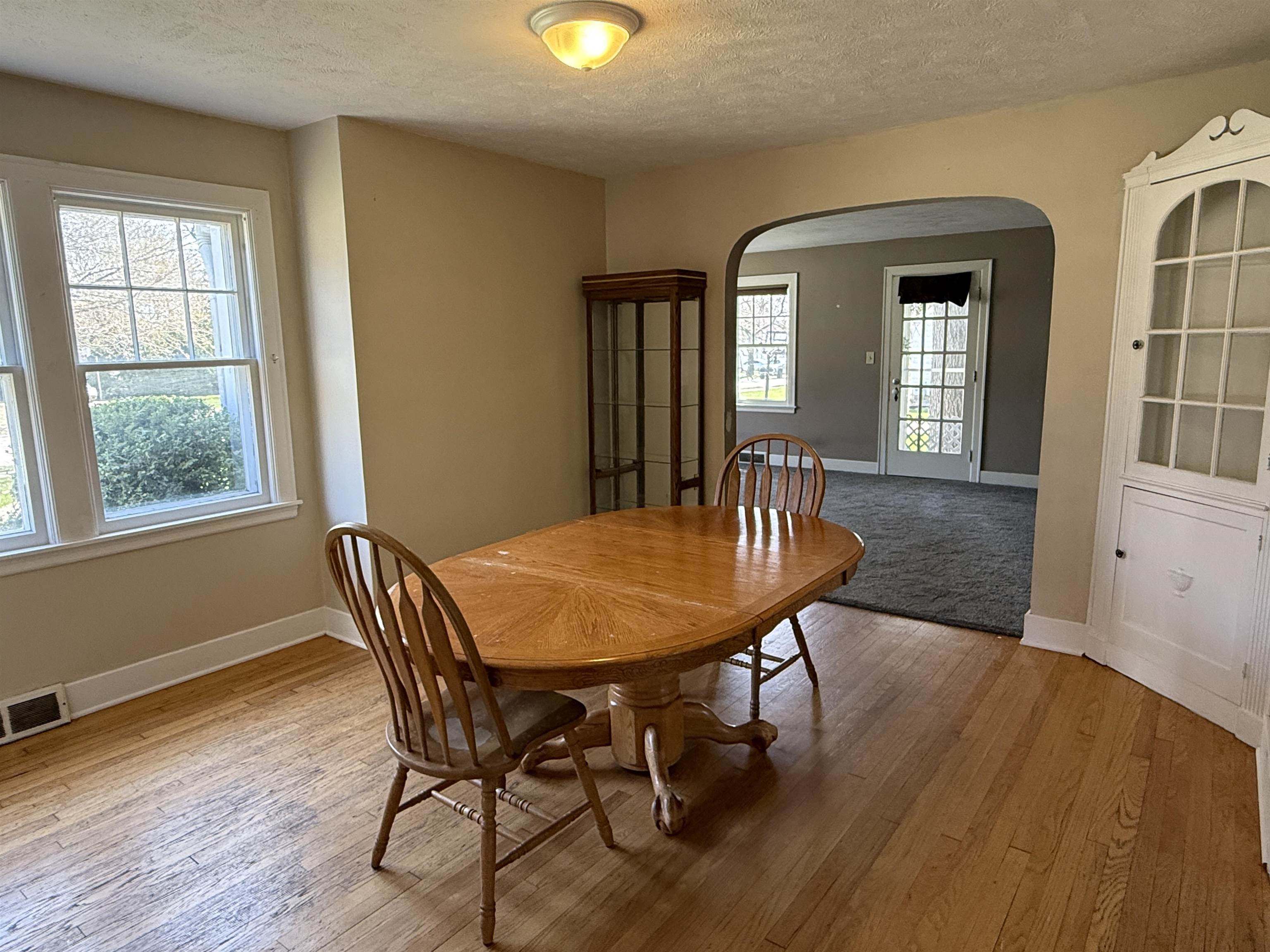 1038 North 8th Street Rochelle, IL 61068 - Photo 6 of 24 a view of a dining room with furniture window and wooden floor
