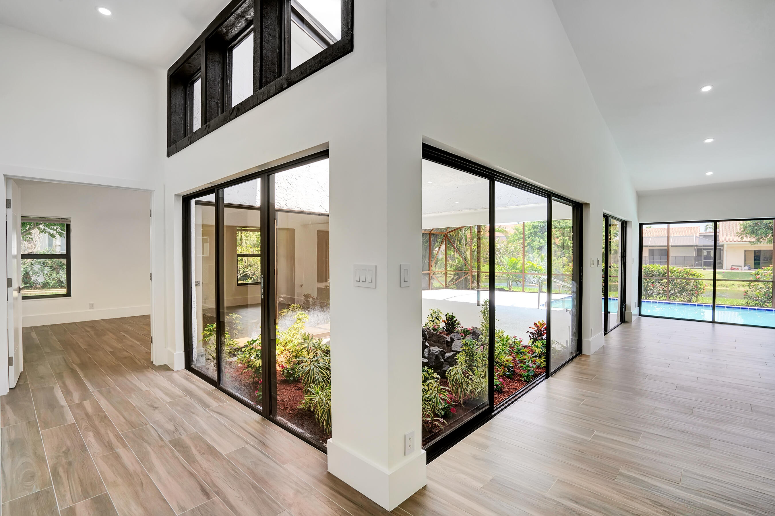 21075 Madria Circle Boca Raton, FL 33433 - Photo 12 of 29 a view of an entryway with wooden floor