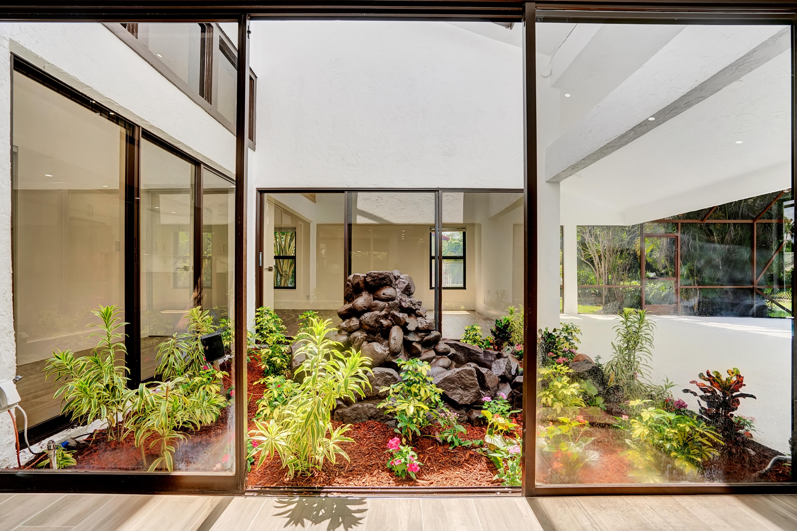 21075 Madria Circle Boca Raton, FL 33433 - Photo 21 of 29 a view of a room with wooden floor