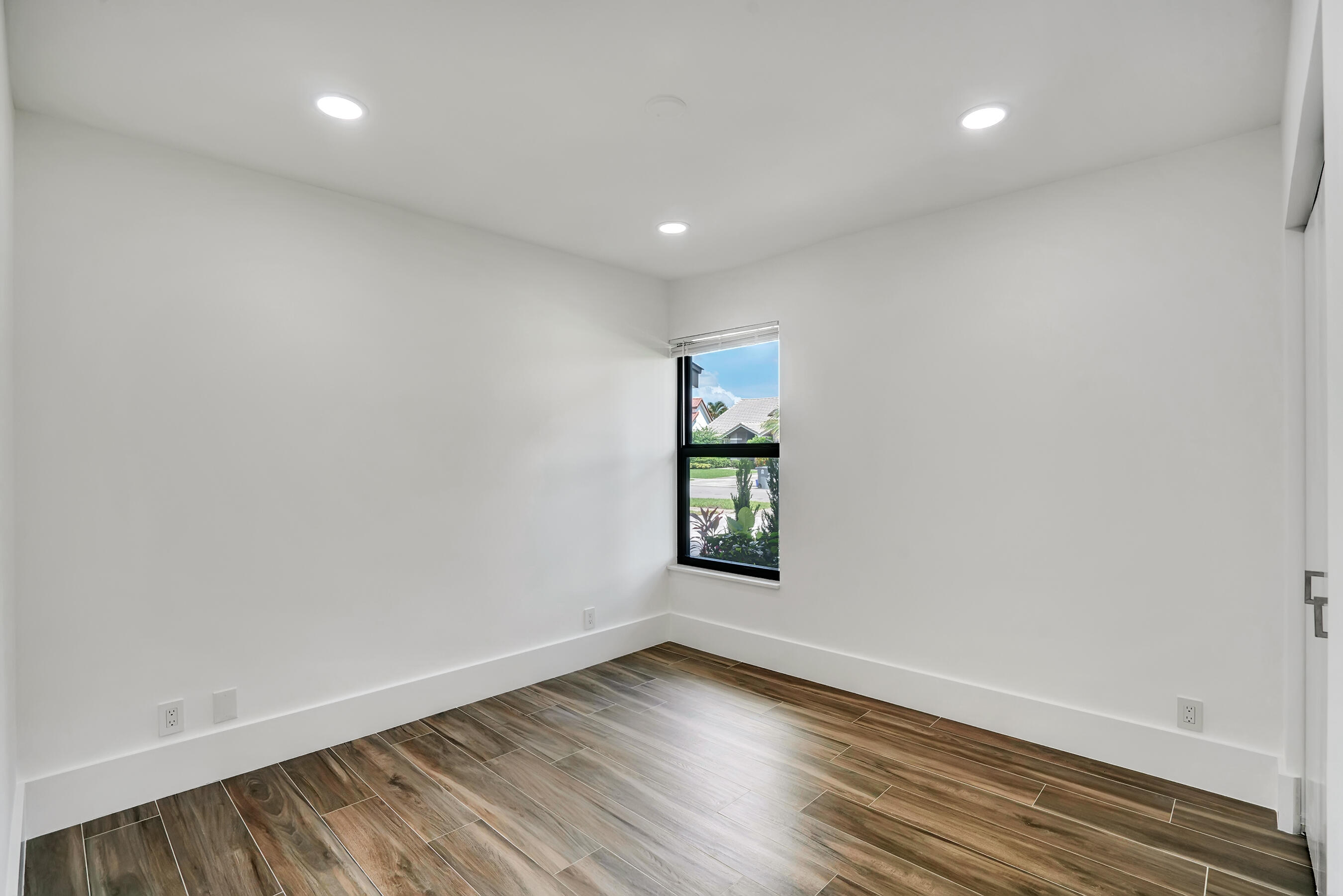 21075 Madria Circle Boca Raton, FL 33433 - Photo 24 of 29 a view of an empty room with a window