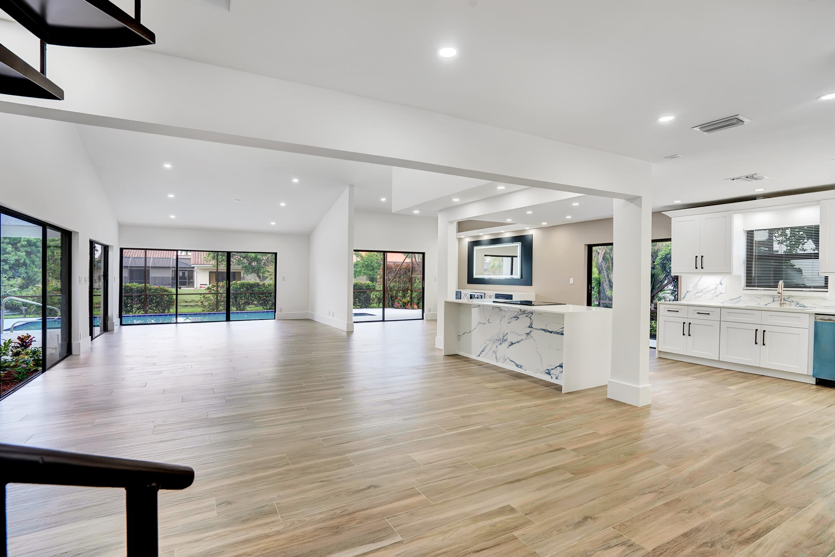 21075 Madria Circle Boca Raton, FL 33433 - Photo 3 of 29 a view of kitchen with cabinets and wooden floor