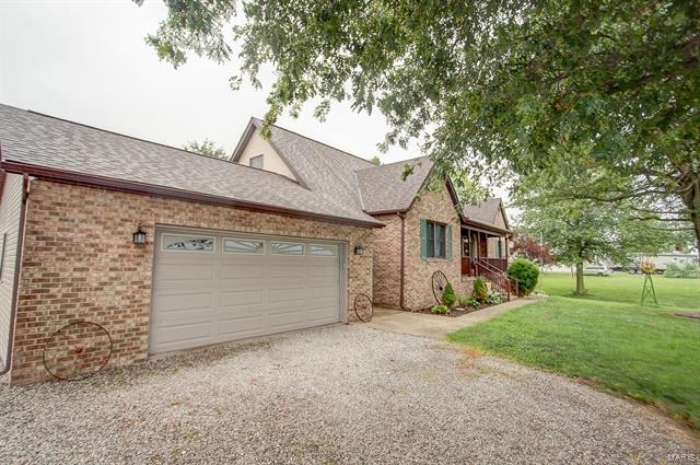 9514 State Route 143 Edwardsville, IL 62025 - Photo 2 of 29 a view of a house with a yard