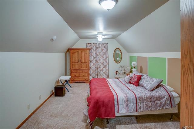 9514 State Route 143 Edwardsville, IL 62025 - Photo 14 of 29 a bedroom with a bed and a window