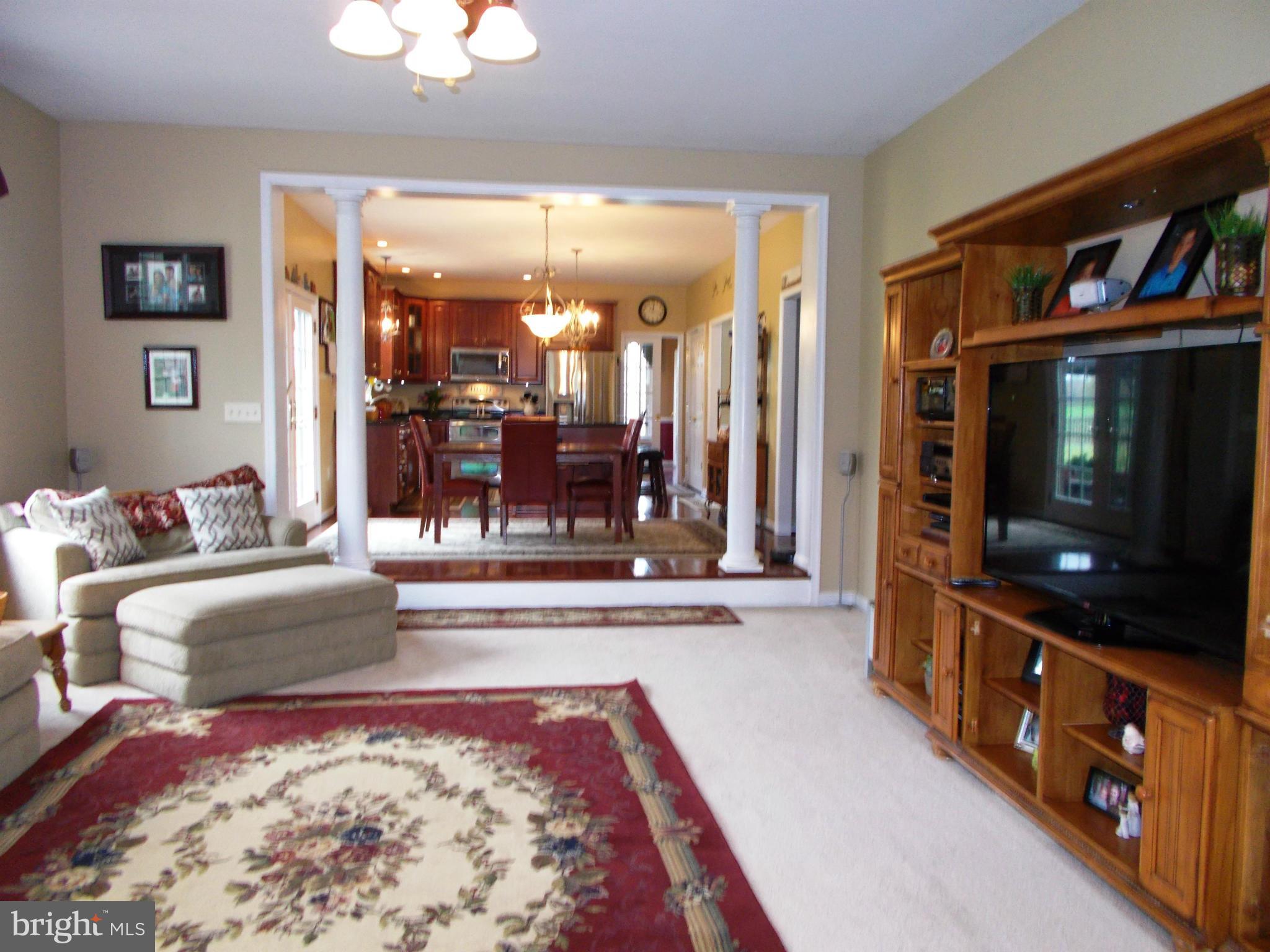 12658 Spickler Road Clear Spring, MD 21722 - Photo 10 of 21 a living room with furniture and a flat screen tv