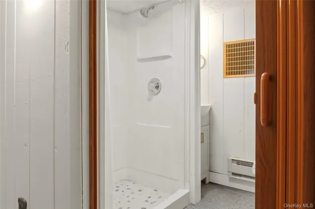 a bathroom with a toilet and a sink