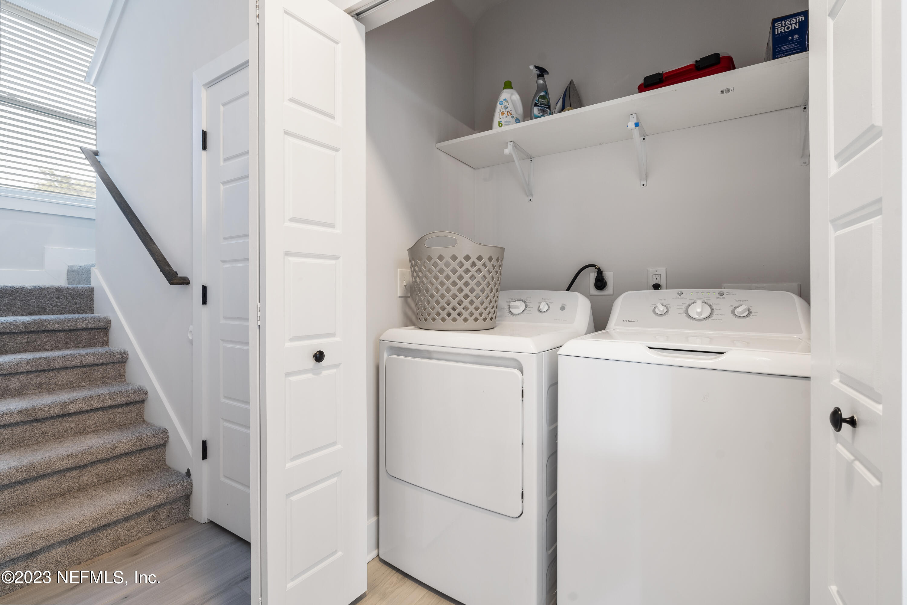 310 3rd Street St. Augustine, FL 32084 - Photo 22 of 46 a utility room with dryer and washer