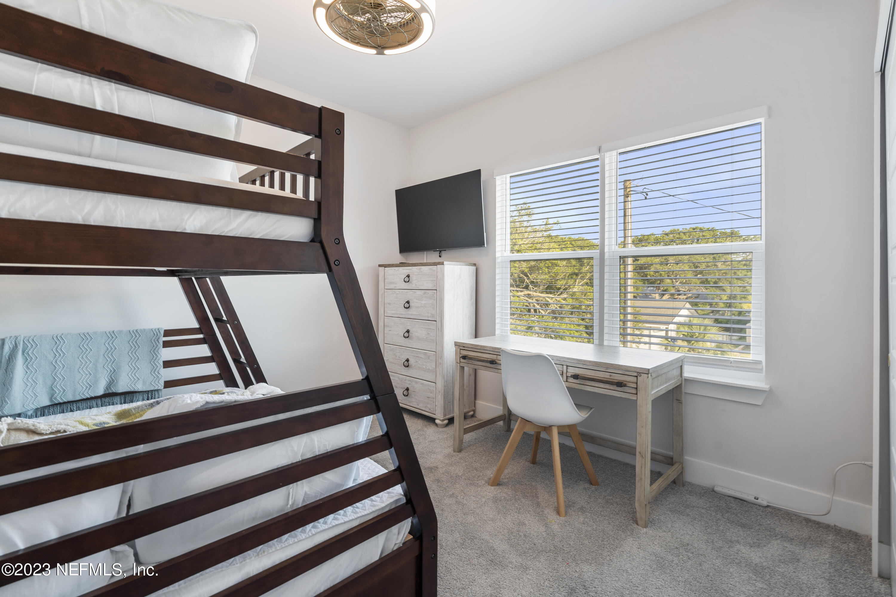 310 3rd Street St. Augustine, FL 32084 - Photo 30 of 46 a view of a livingroom with furniture and a window