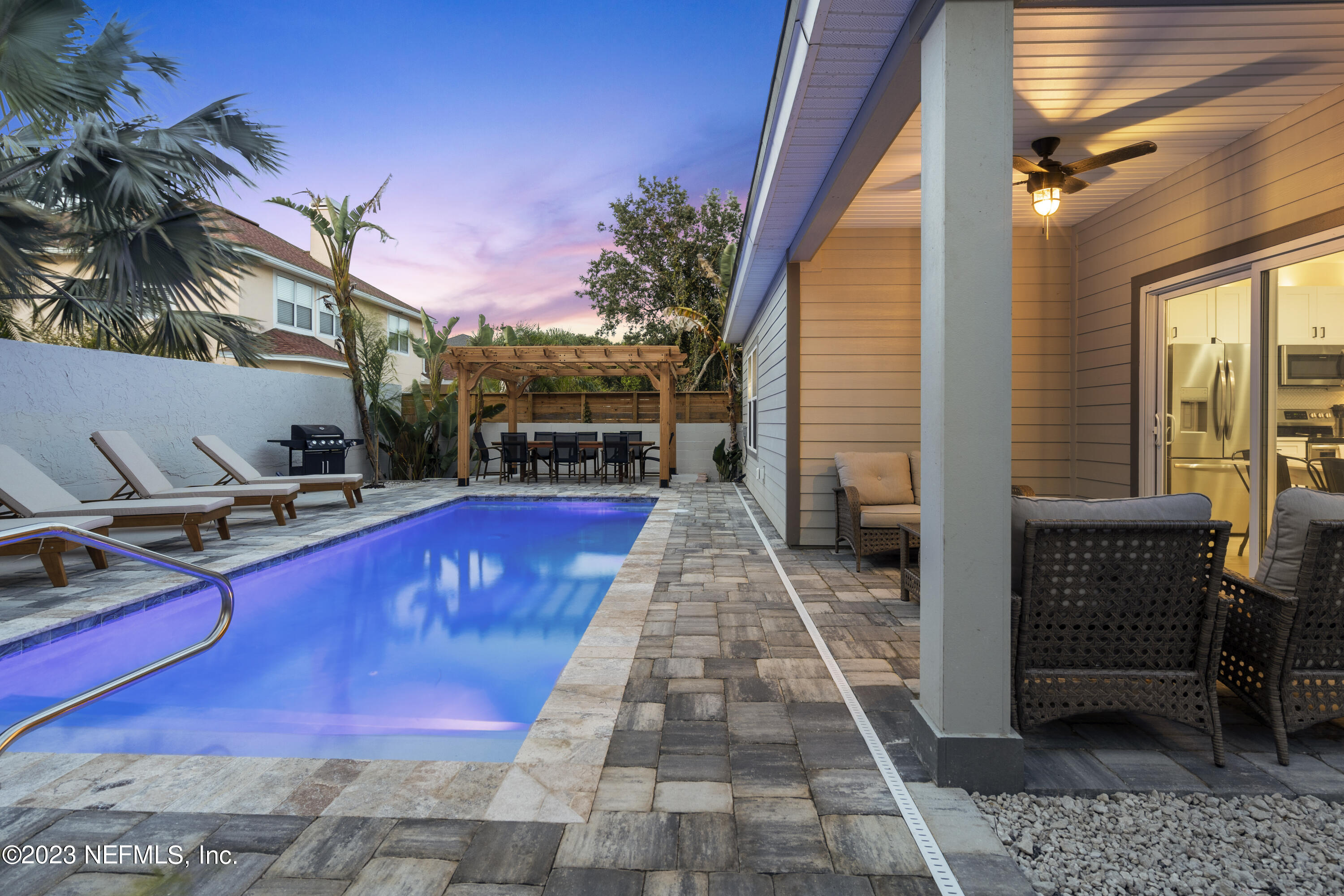 310 3rd Street St. Augustine, FL 32084 - Photo 38 of 46 a view of a balcony with chair and wooden floor