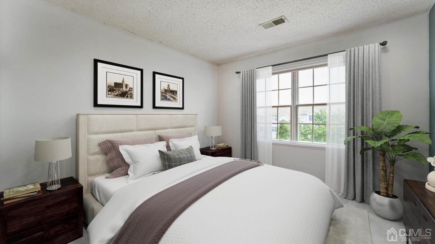 835 Edpas Road New Brunswick, NJ 08901 - Photo 11 of 15 a bedroom with a bed and a window