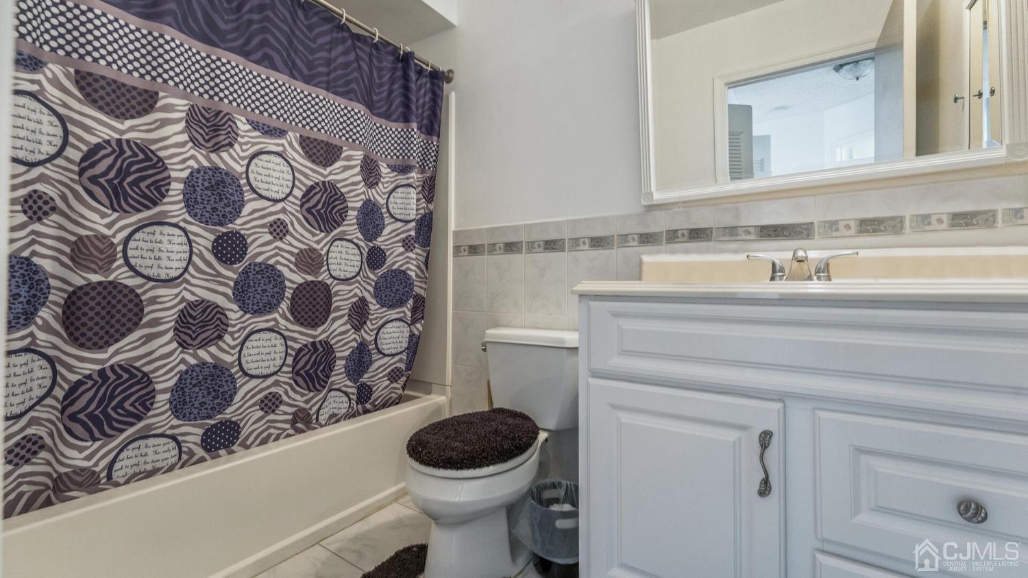 835 Edpas Road New Brunswick, NJ 08901 - Photo 12 of 15 a bathroom with a sink and a toilet