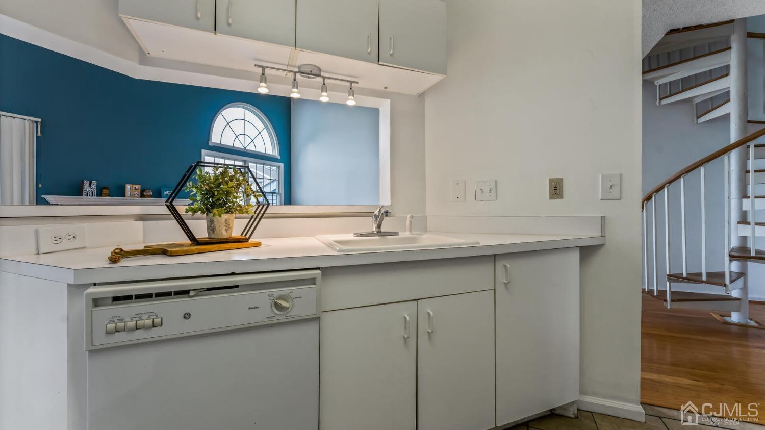835 Edpas Road New Brunswick, NJ 08901 - Photo 6 of 15 a bathroom with a sink and a mirror