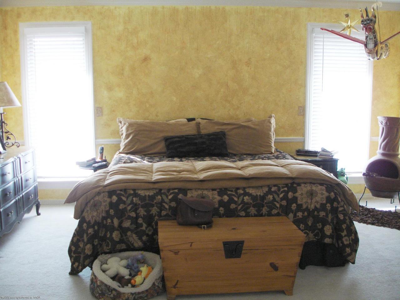 6315 Elmhurst Road Amarillo, TX 79106 - Photo 4 of 9 a bedroom with a bed and a window