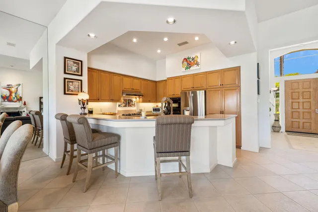 a bathroom with a toilet a sink and a mirror
