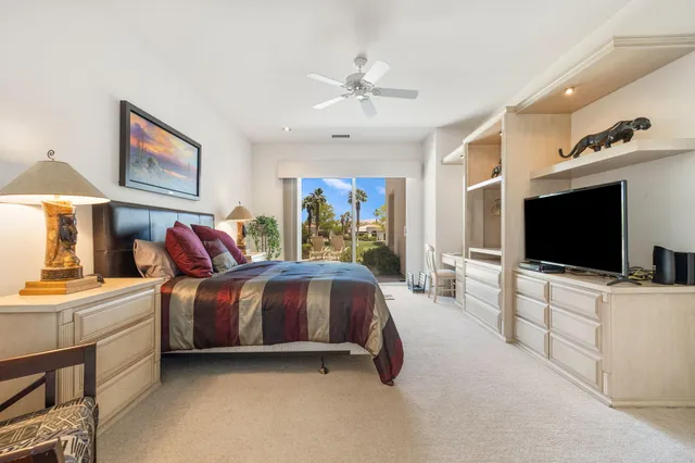 a dining room with furniture and a fireplace