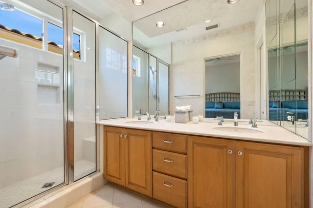 a living room with furniture and a lamp