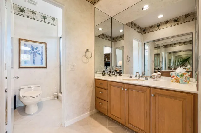 a view of a city with mountains in the background