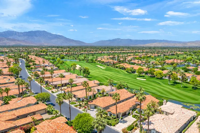 a patio with table and chairs