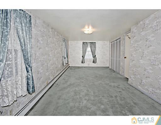 348 Ridge Road Dayton, NJ 08810 - Photo 13 of 21 a view of empty room with wooden floor
