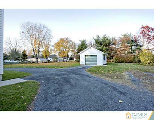348 Ridge Road Dayton, NJ 08810 - Photo 20 of 21 a view of a house with a yard