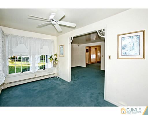 348 Ridge Road Dayton, NJ 08810 - Photo 3 of 21 a view interior of a house with a window and wooden floor